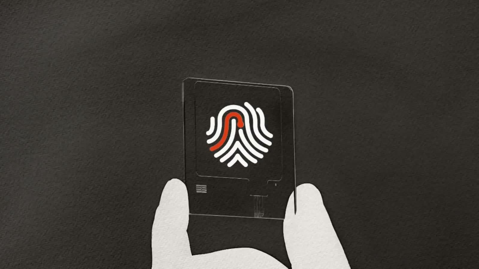 A hand holding a transparent card with the KRNL fingerprint mark on it.